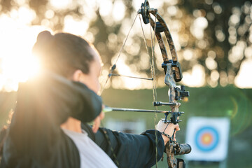 Archer woman, target and bow and arrow practice for outdoor archery, athlete challenge or girl...