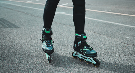 Street, sports and legs of a woman roller skating for fitness, learning and training in the city. Urban, sport and feet and shoes of a person in the road to learn to skate, exercise and hobby