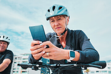 Mature woman, phone or electrical bike helmet in transport location, clean energy or sustainability travel with GPS map. Technology, electric or eco friendly bicycle and mobile, cycling man or couple