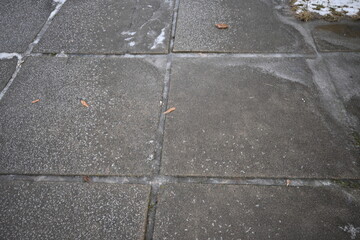 asphalt soviet square concrete tile, asphalt tile covered with thin ice crust, icy ice tile, concrete tile texture on asphalt, bituminous old concrete pavement, gray concrete pavement texture