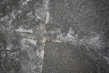 asphalt soviet square concrete tile, asphalt tile covered with thin ice crust, icy ice tile, concrete tile texture on asphalt, bituminous old concrete pavement, gray concrete pavement texture