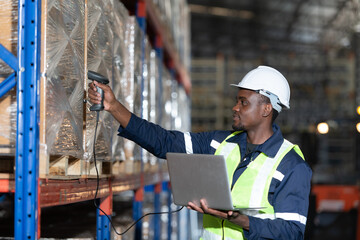 Head of worker in an auto parts warehouse, Examine auto parts that are ready to be shipped to the...