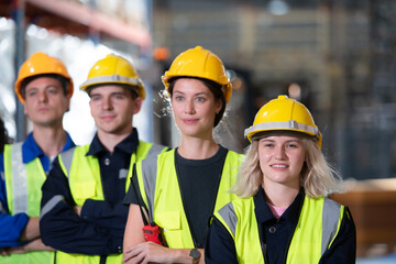 Portrait of worker in an auto parts warehouse, Relax after examine auto parts that are ready to be shipped to the automobile assembly factory.