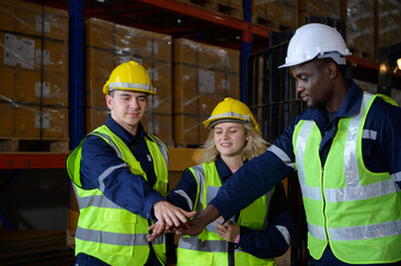 Group of employees in an auto parts warehouse, Examine auto parts that are ready to be shipped to the automobile assembly factory.