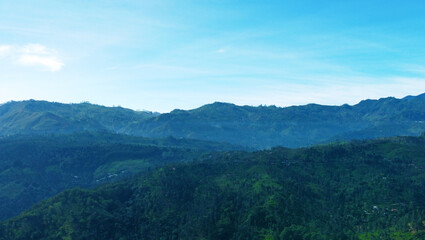 Aerial view of the mountain gorge and hills. Beautiful rock background texture for tourism and advertising. Tropical landscape from a drone