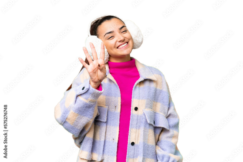 Poster Young woman wearing winter muffs over isolated chroma key background happy and counting four with fingers