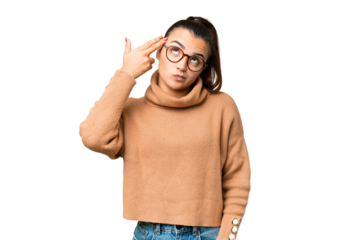 Young beauty woman over isolated chroma key background with problems making suicide gesture