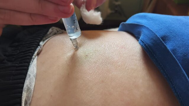 Intramuscular injection of a syringe. The concept of medicine. Close-up