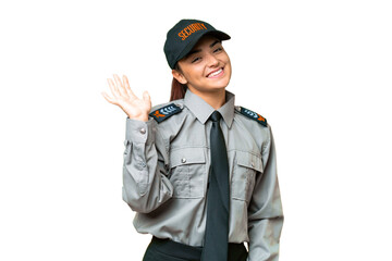 Young safeguard woman over isolated chroma key background saluting with hand with happy expression