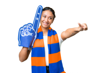 sports fan woman over isolated chroma key background giving a thumbs up gesture