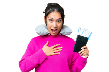 Young Uruguayan woman holding a passport over isolated chroma key background surprised and shocked while looking right