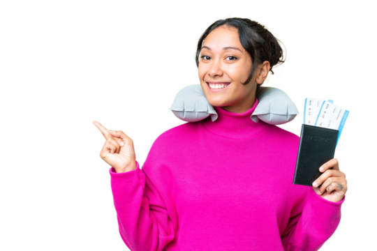 Young Uruguayan woman holding a passport over isolated chroma key background pointing finger to the side