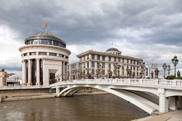 Art Bridge crossing the Vardat River in Skopje - obrazy, fototapety, plakaty