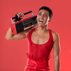 Happy, man and boombox radio in studio for gay, pride and vogue aesthetic with retro 80s tech by...