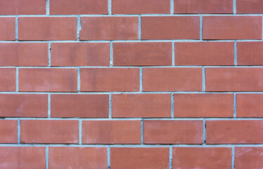 Red brick wall with cement mortar