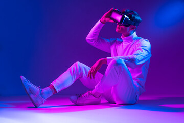 vr augment reality is presented by vr glasses to this man for an unforgettable experience while sit...