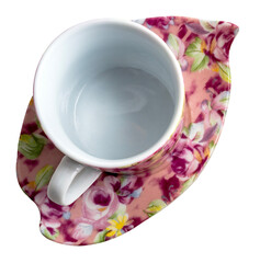 une tasse à café et soucoupe en porcelaine sur fond transparent