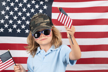 Child with american flag, independence day 4th of july. United States of America concept. Fourth of july independence day of the usa. USA flag concept.