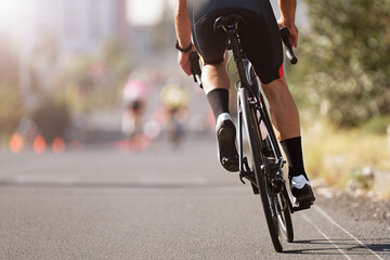 Fototapeta na wymiar Road bike cyclist man cycling, athlete on a race cycle