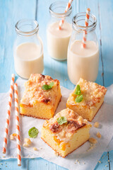 Yummy peach cake with glaze. Served with milk.