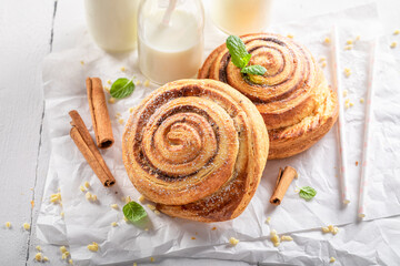 Traditionally and tasty cinnamon rolls served with milk.
