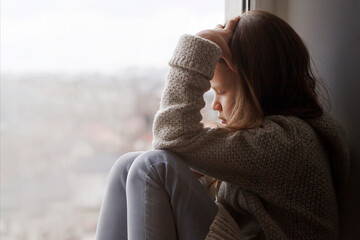 Stressed Sad Teenager Girl feeling Lonely at Home. Teen Problem. Adolescent Negative Thoughts. Support Teen concept.