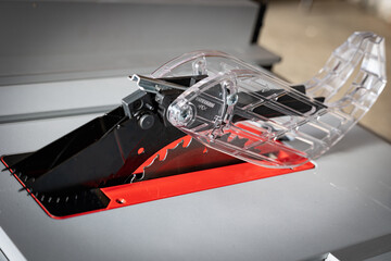 The smart guard system of the table saw blade includes a riving knife that can be adjusted to three different positions, an anti-kickback device, and a barrier guard assembly.