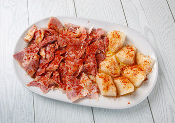 Pork pork dish with boiled potatoes, typical Galician dish