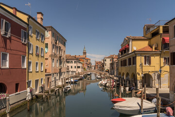 Fototapeta na wymiar Chioggia city view along a canal.