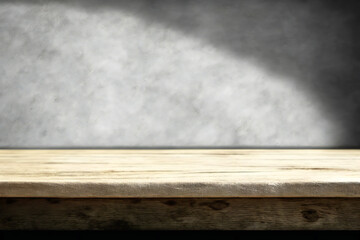 Wood table counter with concrete grunge texture background
