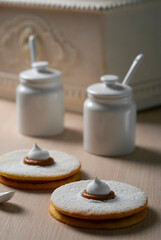 close up of fresh cookies with Bizet on table