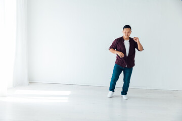 a man dancing in the hall of the bachata kizomba salsa studio