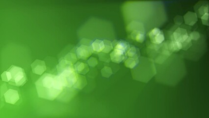 Defocused green bokeh lights background. This elegant motion animation with hexagonal bokeh particles is full HD and a seamless loop. Suitable as an abstract St Patrick's Day background. - Powered by Adobe