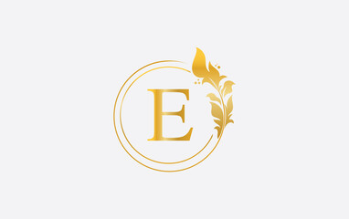 Golden leaf and circle logo design. Golden beauty and business symbol and alphabets design