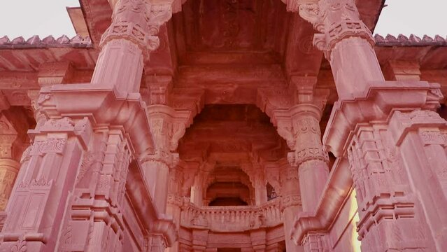 red stone ancient hindu temple architecture from unique angle at day