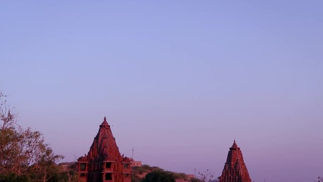 red stone ancient hindu temple architecture from unique angle at day