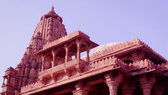 red stone ancient hindu temple architecture from unique angle at day