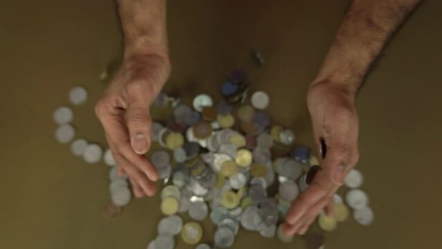 A handful of Coins falling, in debt, Expensive thing, Indian Financial Concept