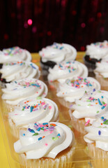 Cupcakes on Table at Party With Bokeh Background
