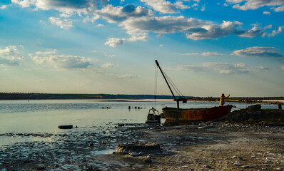 Old iron boat for the extraction of therapeutic mud on the Kuyalnitsky estuary, Ukraine