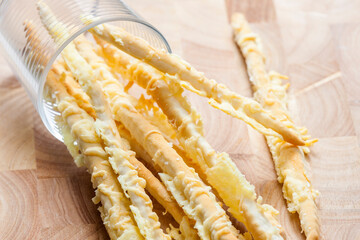 homemade cheese sticks in a glass