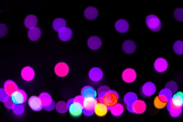 Round, bright, blurry garland lights.