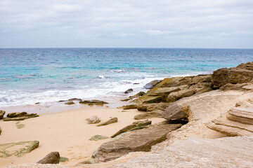 Wild beach with turquoise water in Tarifa.
