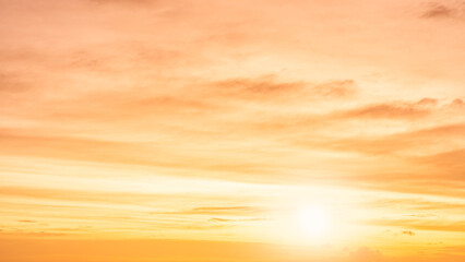 Naklejka na ściany i meble Sunrise sky in the morning with orange sunlight clouds fluffy, golden hour