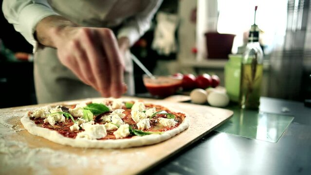 chef cooking tasty margherita pizza