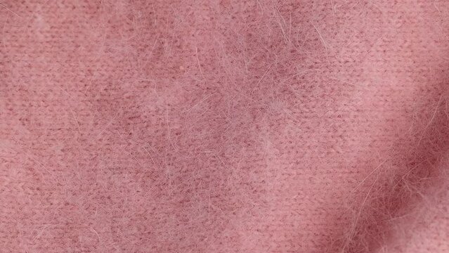 Close up of soft pink angora cloth, textile detail in pastel colors