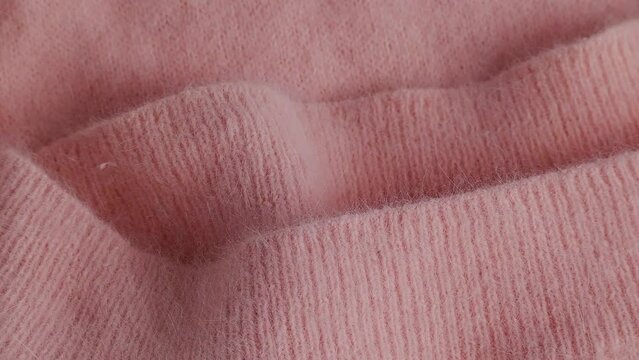 Close up of soft pink angora cloth, textile detail in pastel colors