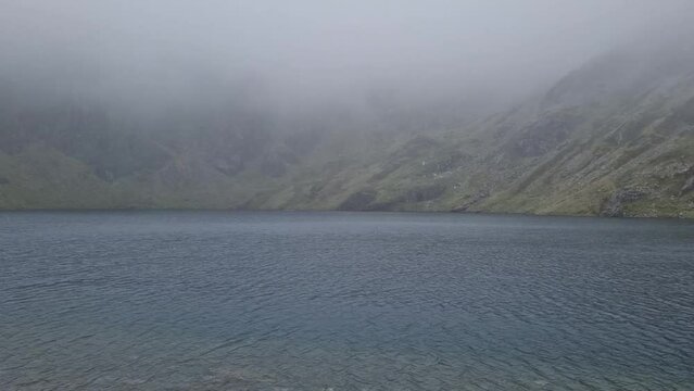 Lake Llyn Cau, in the peak Cadair Idris ,Penygadair in Wales, United Kingdon 2022.
