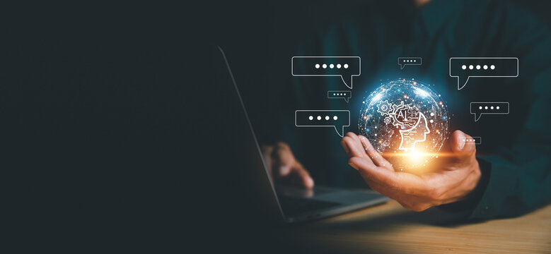 Chatbot chat AI concept, artificial intelligence Businessman using AI smart robot technology inputting commands to analyze data and build something. future technology changes.