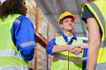 Group of professional multi national warehouse workers or staffs having a group discussion together...